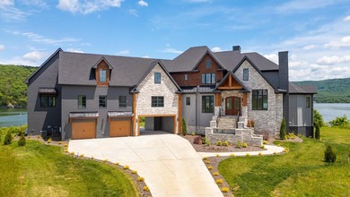 Experience the pinnacle of lakeside living with this stunning - photo 3