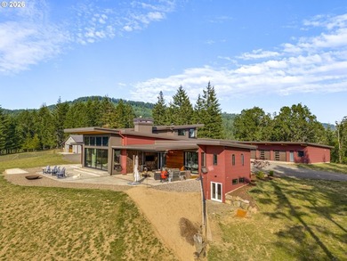 Spectacular modern masterpiece on 124.5 acres. This 2023-built - photo 2
