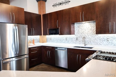 Imagine living in the vibrant Heart of Downtown, where the pulse