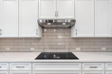 This exceptional 2024 residence presents 3 bedrooms, 2.5 baths