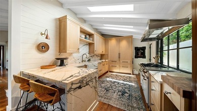 Just a stone's throw from the beach, 27 Emerald Bay offers a - photo 21