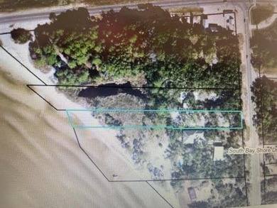 GORGEOUS BAY FRONT LOT FACING DUE WEST FOR AWESOME SUNSETS. THIS - photo 4