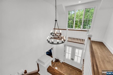 Built in 2023, this stunning custom Colonial Farm House offers - photo 5