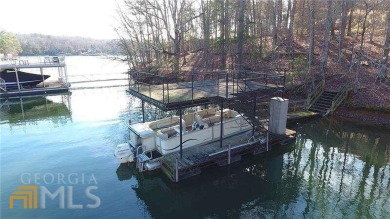 In a neighborhood of million dollar homes, this 1/3 acre lot - Lake Lot For Sale in Gainesville, Georgia