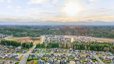 0.19 acre parcel backs on to a park-like setting and provides a - photo 9