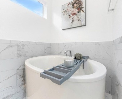 1016 Signet Loop is a 6-bedroom, 4.5-bath waterfront estate in - photo 38