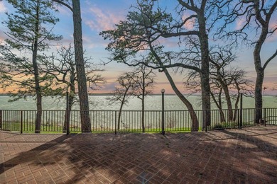 Set high above the shoreline on a commanding bluff, this rare 1 - photo 4