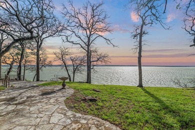 Set high above the shoreline on a commanding bluff, this rare 1 - photo 6