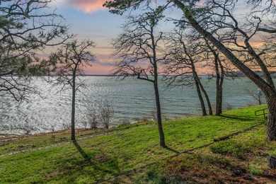 Set high above the shoreline on a commanding bluff, this rare 1 - photo 8