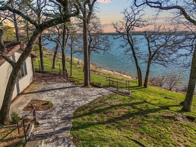 Set high above the shoreline on a commanding bluff, this rare 1 - photo 9