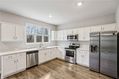 Welcome to 91 Richmond Dr, a home that boasts a kitchen equipped - photo 2