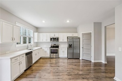 Welcome to 91 Richmond Dr, a home that boasts a kitchen equipped - photo 7