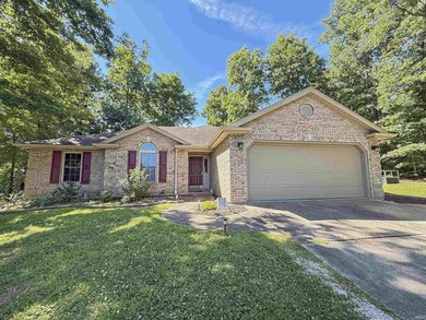 Check out this all brick home located near the golf course in - photo 1