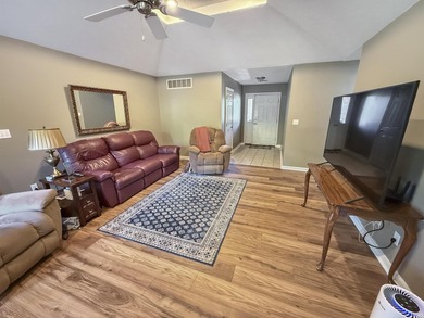 Check out this all brick home located near the golf course in - photo 3