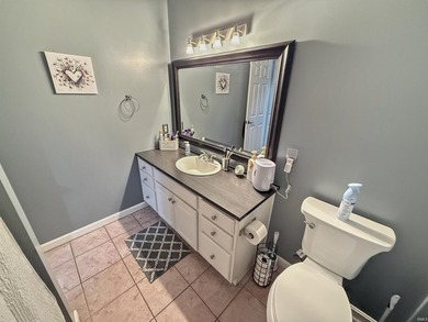 Check out this all brick home located near the golf course in - photo 8