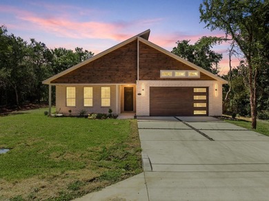 Modern-contemporary style with 4 BR 2 baths nestled on .26 acres - photo 1