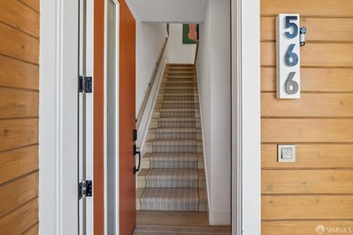Thoughtfully renovated in 2023, this exceptional bi-level upper - photo 3