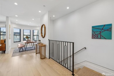 Thoughtfully renovated in 2023, this exceptional bi-level upper - photo 4
