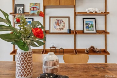 Thoughtfully renovated in 2023, this exceptional bi-level upper - photo 7