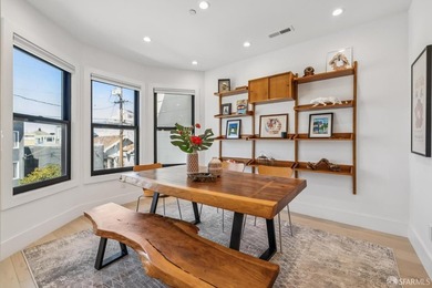 Thoughtfully renovated in 2023, this exceptional bi-level upper - photo 8