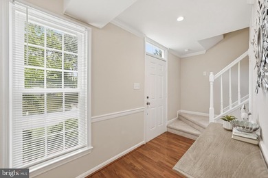 Welcome home to this spacious three-level single-family home - photo 2
