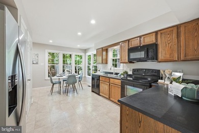 Welcome home to this spacious three-level single-family home - photo 8