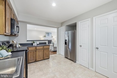 Welcome home to this spacious three-level single-family home - photo 10