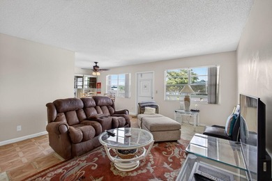 Serene lake views from the balcony highlight this 2/2 floor plan - photo 2
