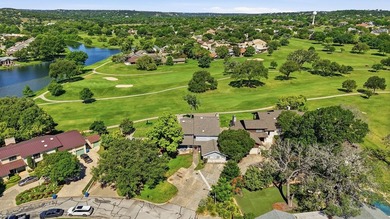 Enjoy stunning golf course and lake views from this exceptional - photo 2
