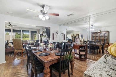 Enjoy stunning golf course and lake views from this exceptional - photo 9