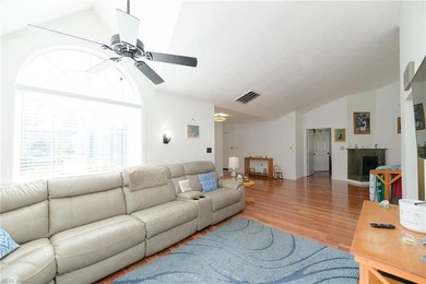 Beautiful one-story home with vaulted ceilings in sought-after