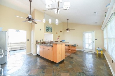 Beautiful one-story home with vaulted ceilings in sought-after