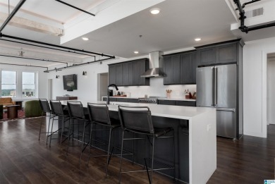 Step into refined downtown living with Unit 600 at The Alston, a