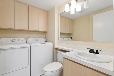 Updated 2 bedroom, 2.5-bathroom DiVosta built townhouse in the - photo 12