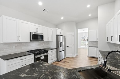 STOP THE CAR - This one is Stunning ~ Better than new, this home