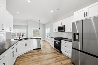 STOP THE CAR - This one is Stunning ~ Better than new, this home