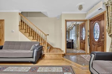 Rare opportunity to own a legal two-family brick home in the - photo 2