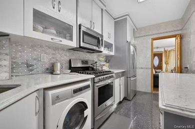 Rare opportunity to own a legal two-family brick home in the - photo 6