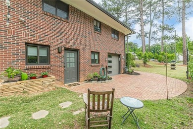 A classic brick ranch, reimagined with intention and scale, set - photo 18
