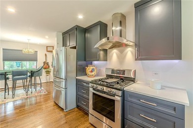 A classic brick ranch, reimagined with intention and scale, set - photo 21