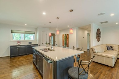 A classic brick ranch, reimagined with intention and scale, set - photo 23