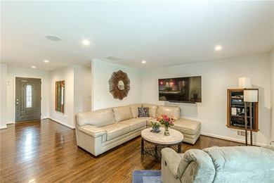 A classic brick ranch, reimagined with intention and scale, set - photo 28