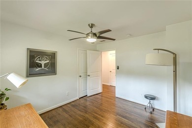 A classic brick ranch, reimagined with intention and scale, set - photo 33