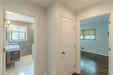 A classic brick ranch, reimagined with intention and scale, set - photo 41