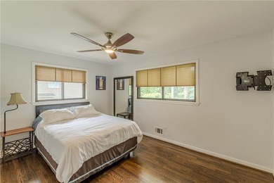 A classic brick ranch, reimagined with intention and scale, set - photo 42