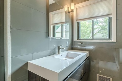 A classic brick ranch, reimagined with intention and scale, set - photo 47