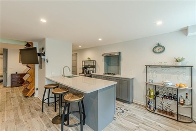A classic brick ranch, reimagined with intention and scale, set - photo 49