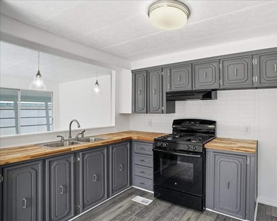 Completely remodeled 2 bedroom, 2 bath home here at Tanglewood - photo 8