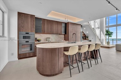 A TRUE MASTERPIECE! Fully Renovated 2 Story Penthouse with over