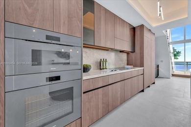 A TRUE MASTERPIECE! Fully Renovated 2 Story Penthouse with over